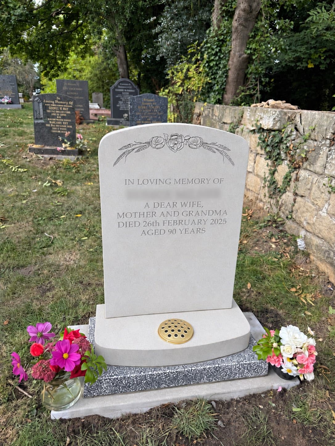 York stone memorial with carved ornamentation